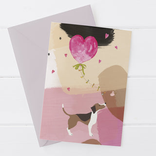 Dog Holding A Heart Greetings Card